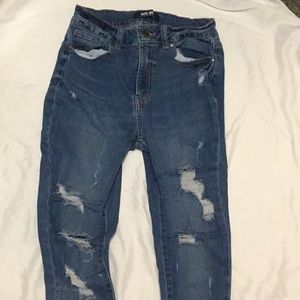 Blue trendy skinny ripped jeans